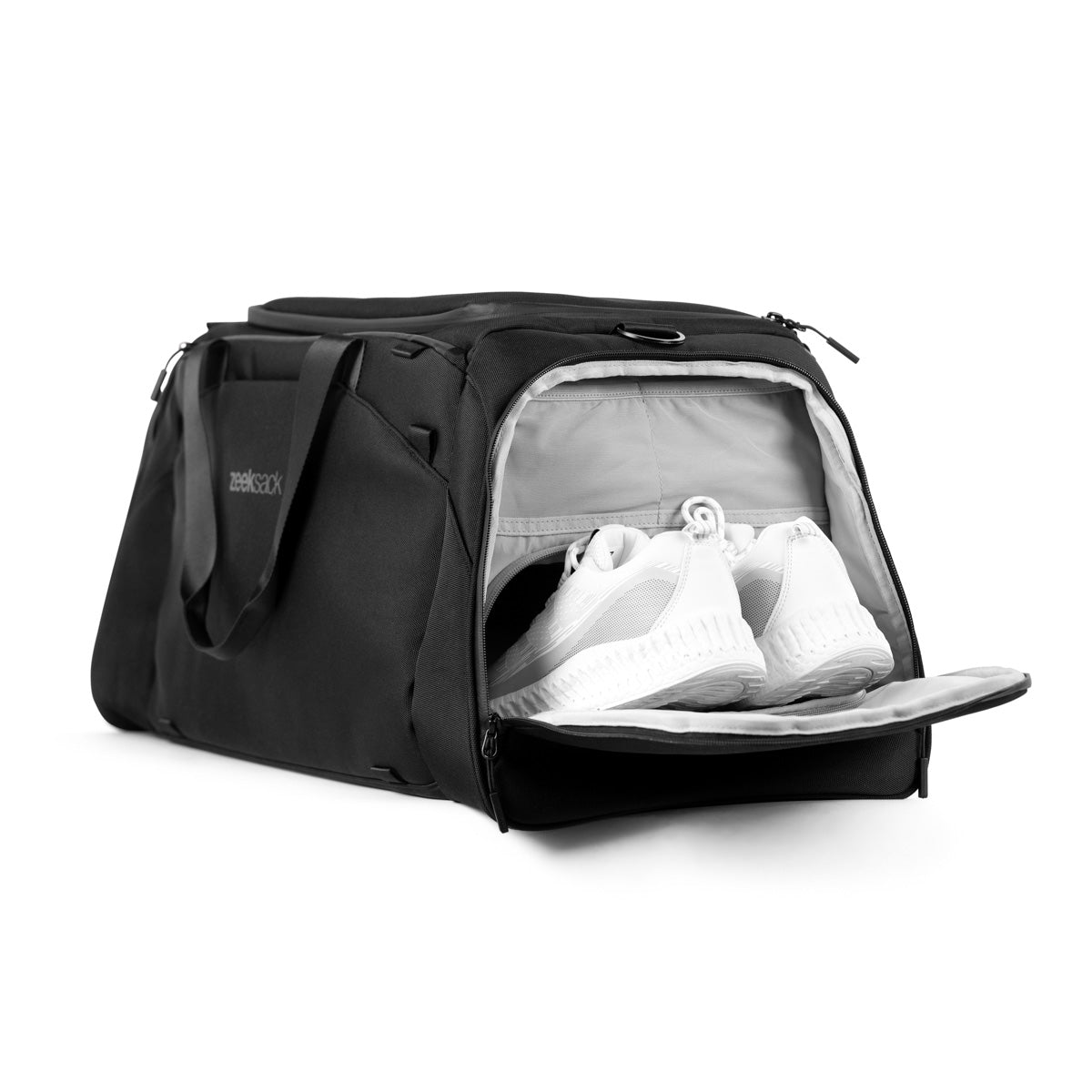 Torba Zeeksack The Duffelbag z otwartą przegrodą na buty – białe sportowe buty widoczne w bocznej kieszeni.